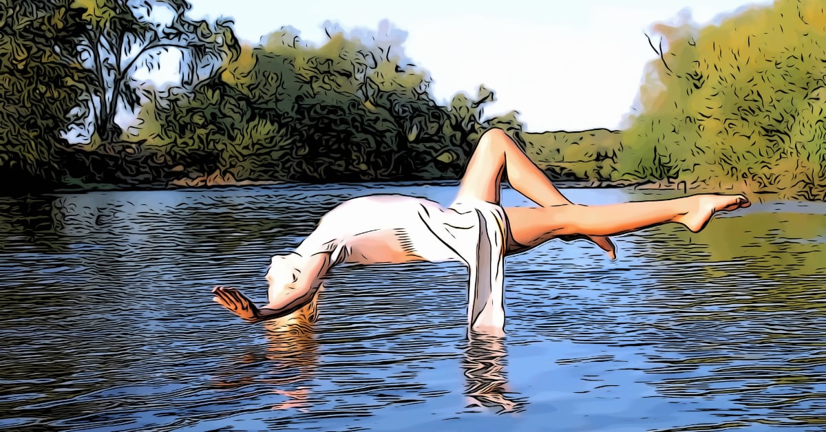 woman floating over water